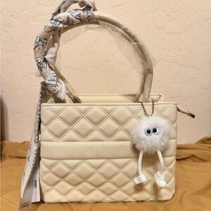 Elegant Cream Quilted Handbag